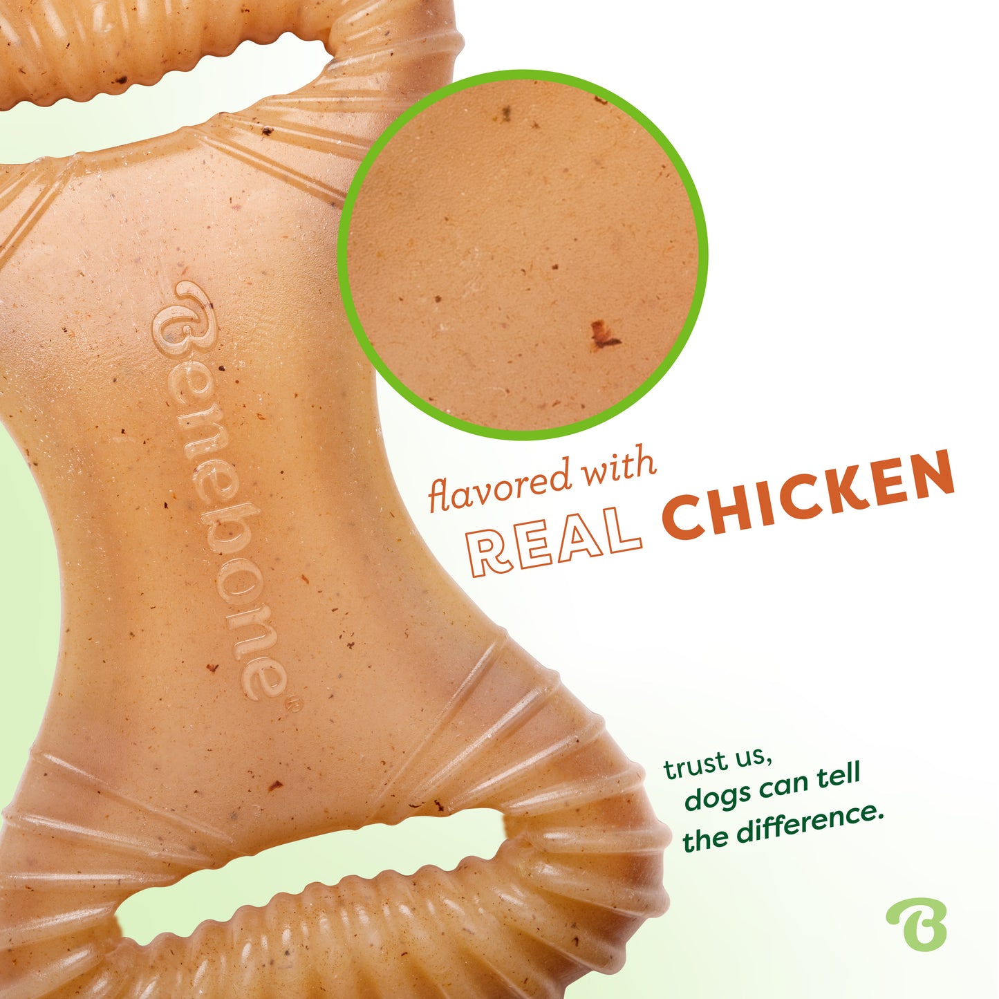 Flavored with real chicken. Trust us, dogs can tell the difference. Close up of a Benebone chicken dental chew.